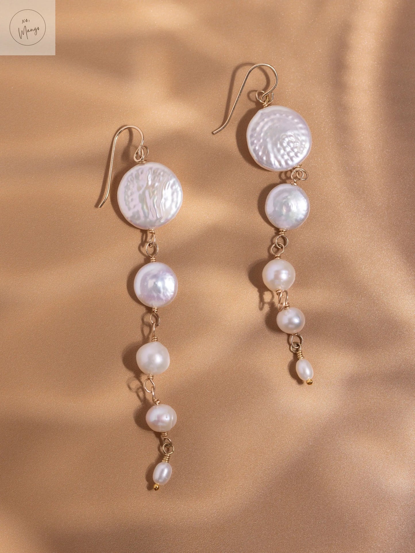 Legacy Pearls: 5 tier Pearl earring xo, Mango