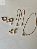 Ella Hoops- Pearl huggie earrings xo, Mango