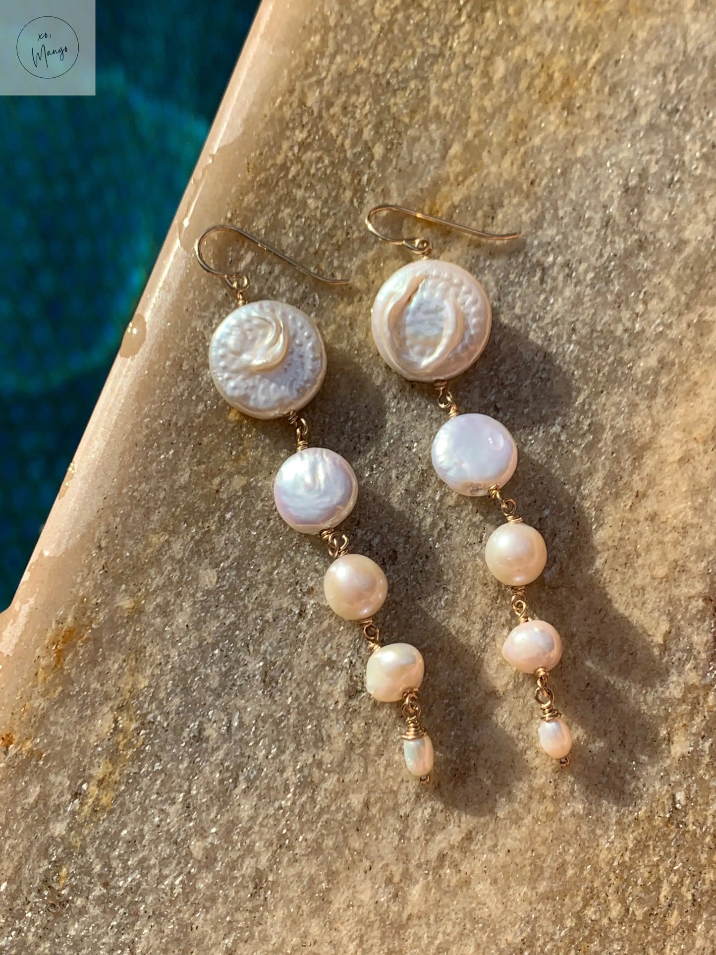 Legacy Pearls: 5 tier Pearl earring xo, Mango