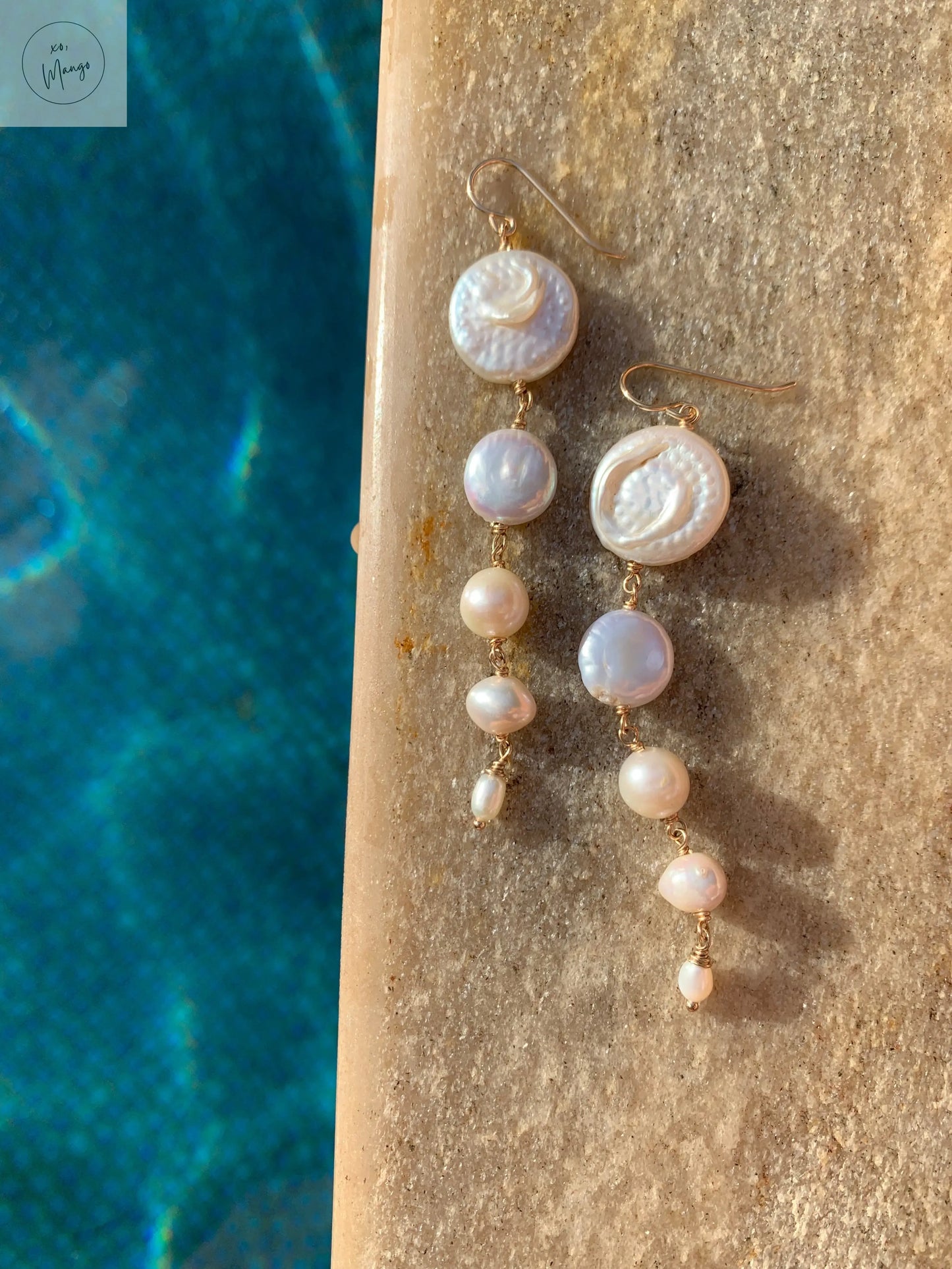 Legacy Pearls: 5 tier Pearl earring xo, Mango